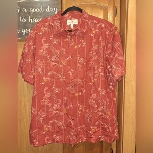 An Island Shores short sleeve button-down Hawaiian shirt in a size men's XL